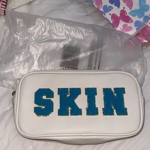 Neutrogena White Cosmetic Pouch with Teal Interior